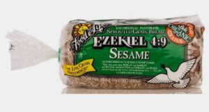 A packaged loaf of Ezekiel 4:9 sesame sprouted grain bread.